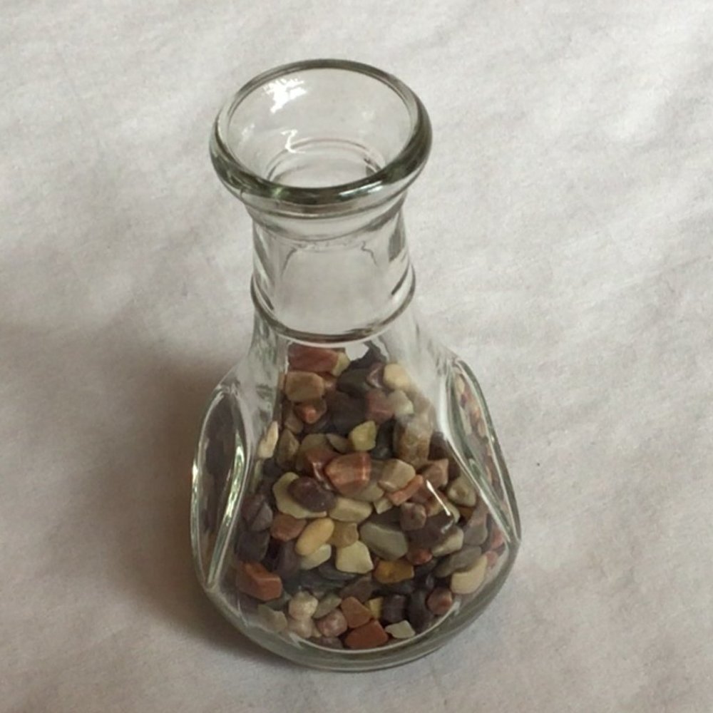 Mini clear glass vase with pebbles for weight